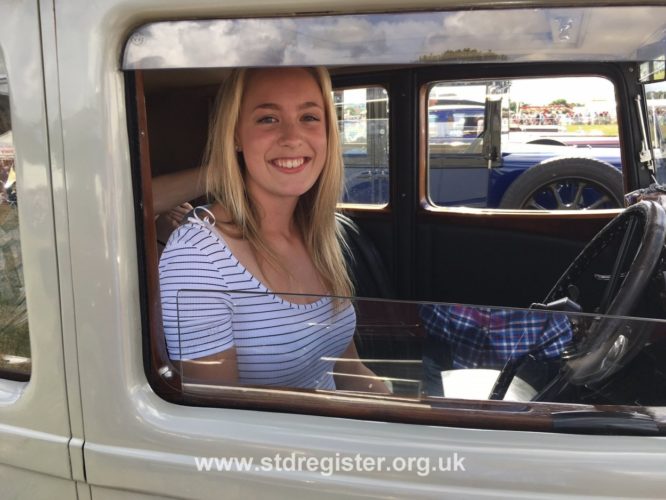 Young lady driving vintage Sunbeam